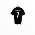 A black short-sleeve soccer jersey with 'RONALDO' and the number '7' printed in white on the back, hanging on a wooden hanger against a plain white background.