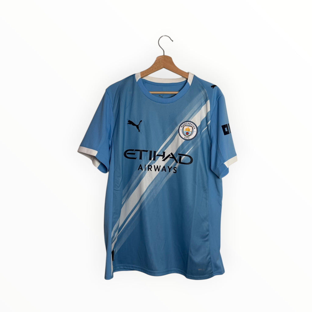 Blue and white football shirt puma manchester city