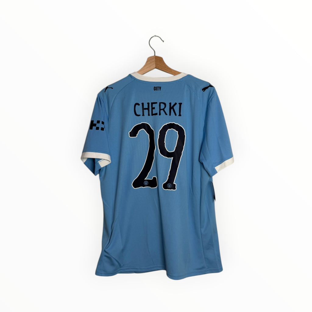 Blue football shirt Rayen Cherki number 29