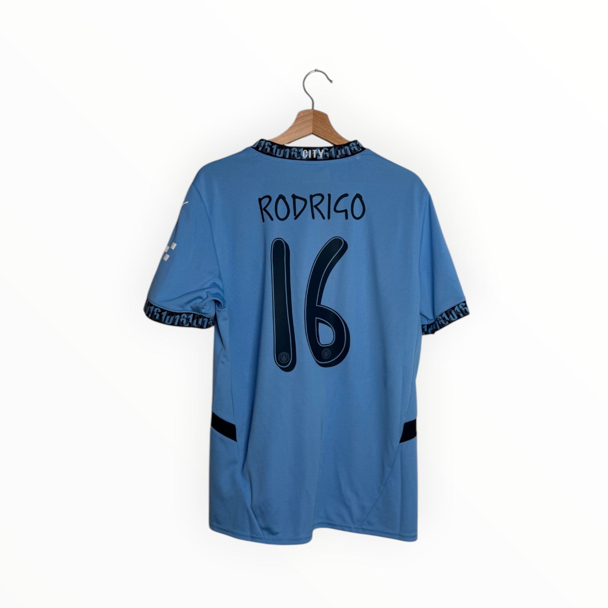 Blue football shirt Rodrigo number 16