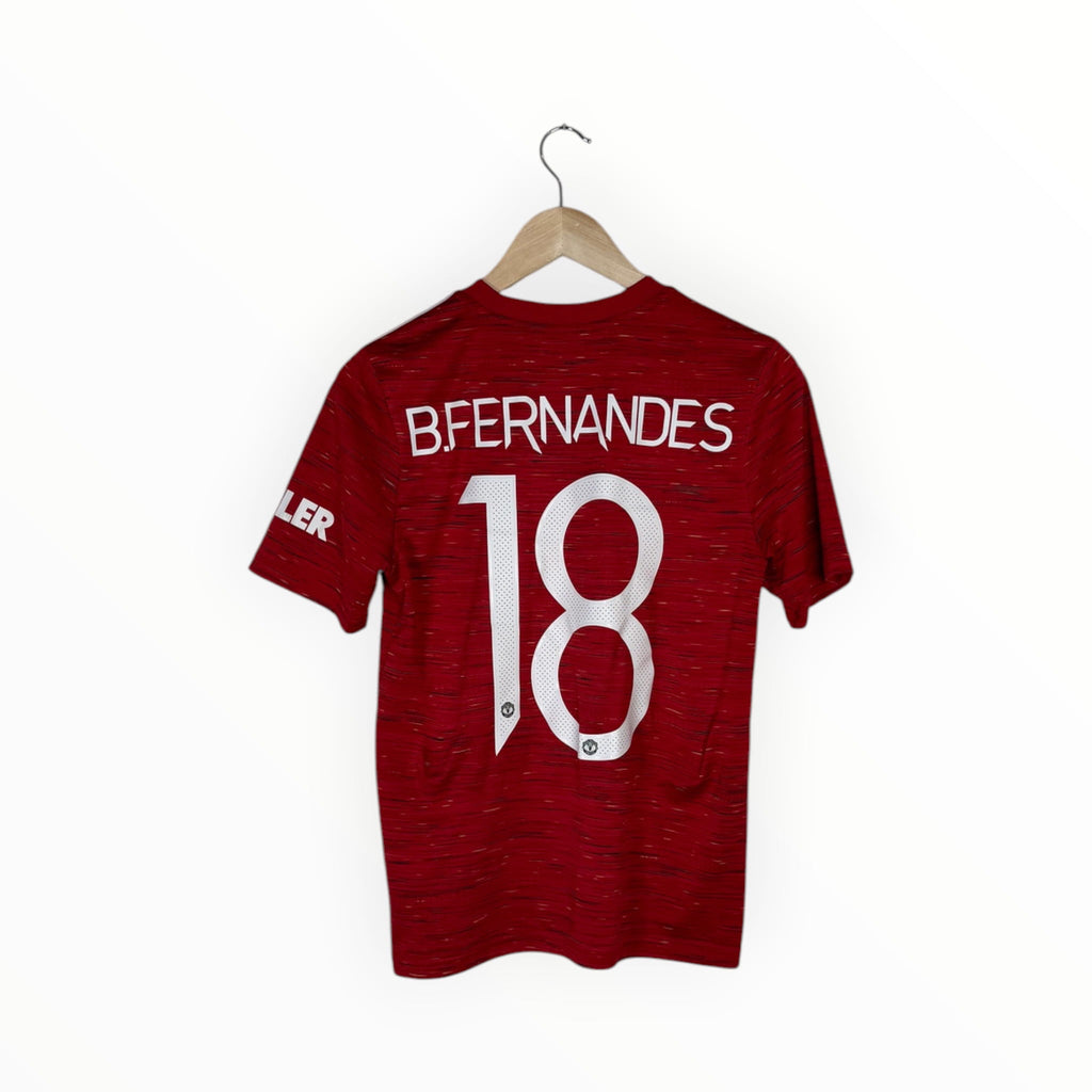 A red short-sleeve soccer jersey hanging on a wooden hanger against a plain white background. The back of the shirt features the name 'BFERNANDES' and the number '18' in large white block letters.