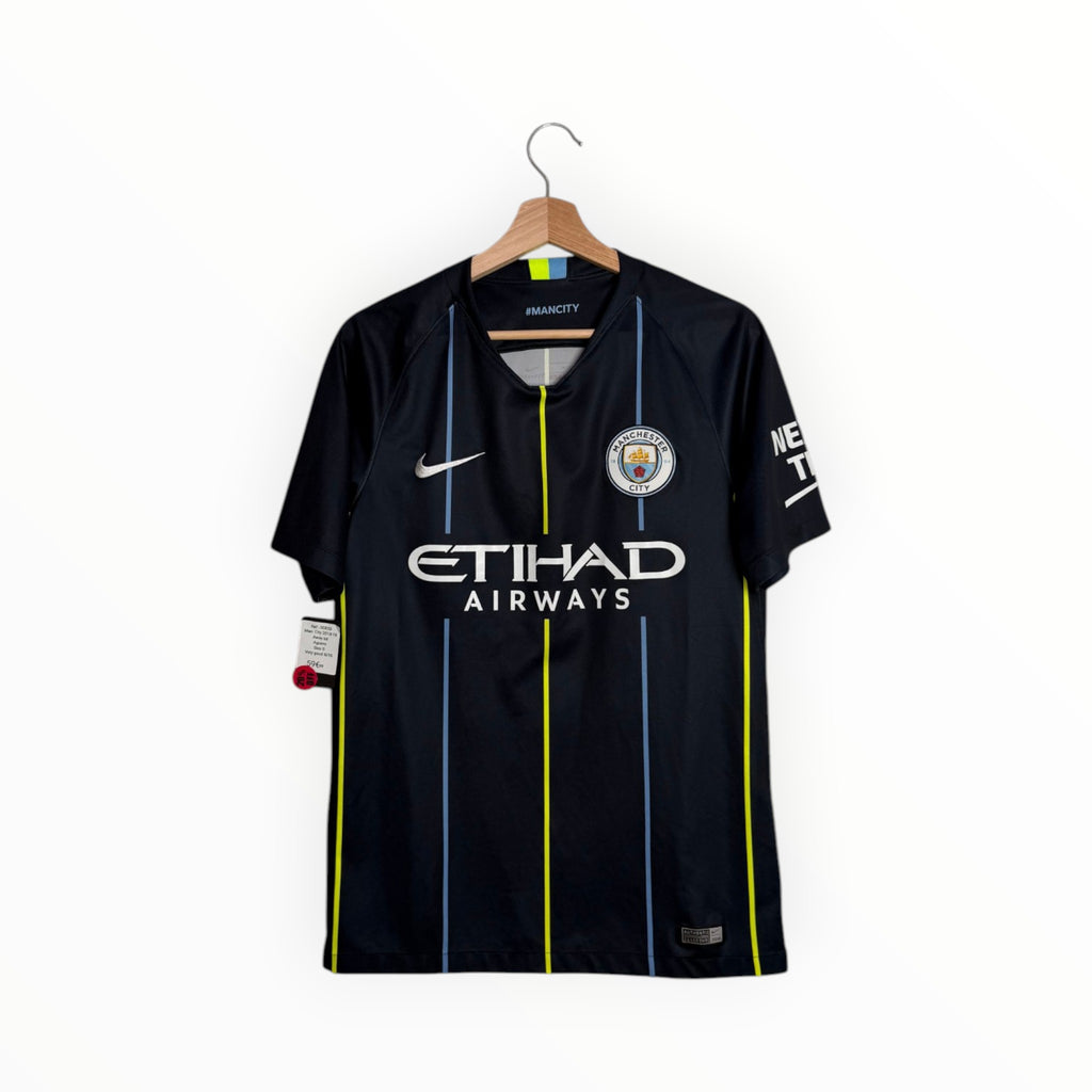Dark blue and yellow football shirt nike Manchester city