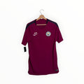Dark red football shirt with black stripes nike Manchester city
