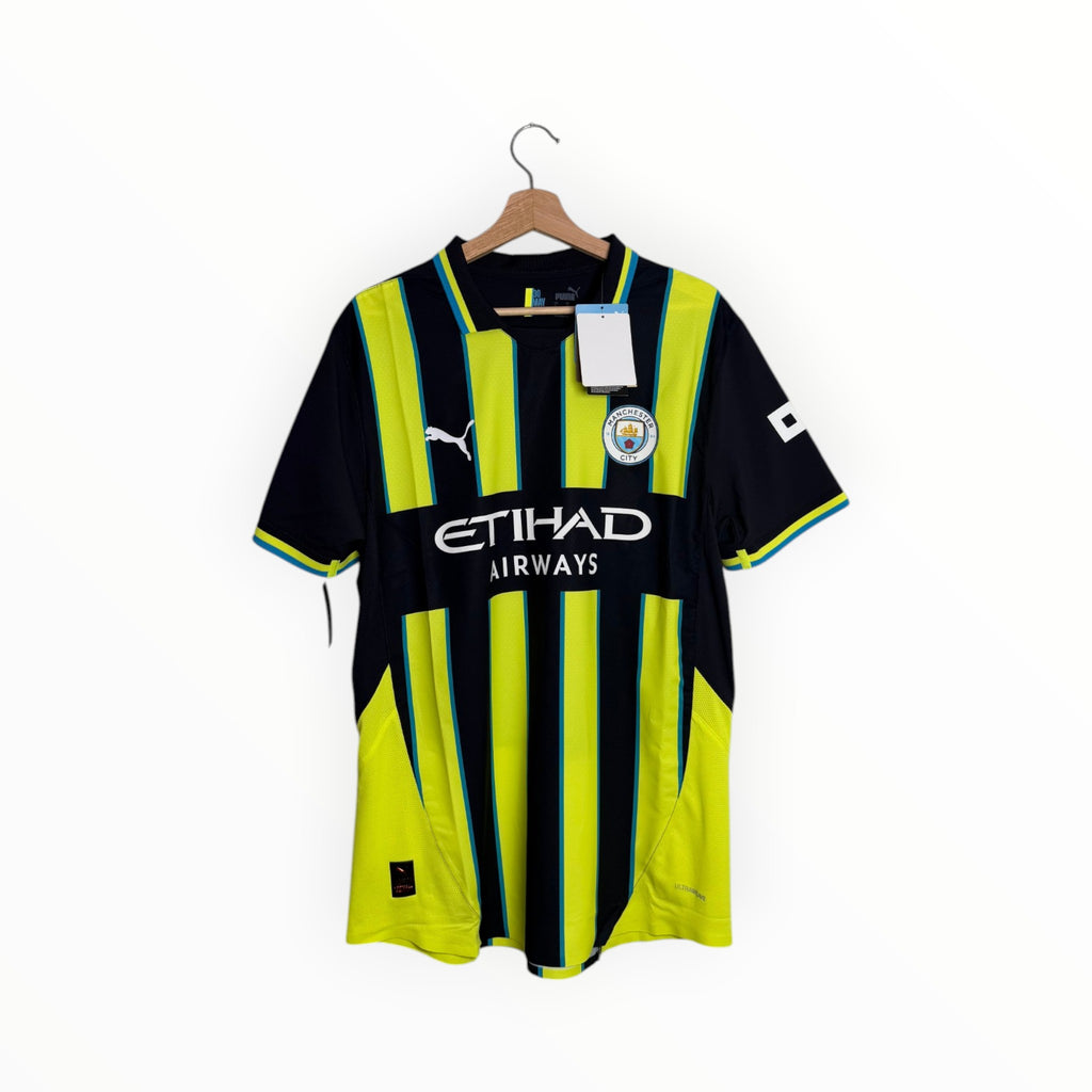 Manchester city puma yellow and black football shirt