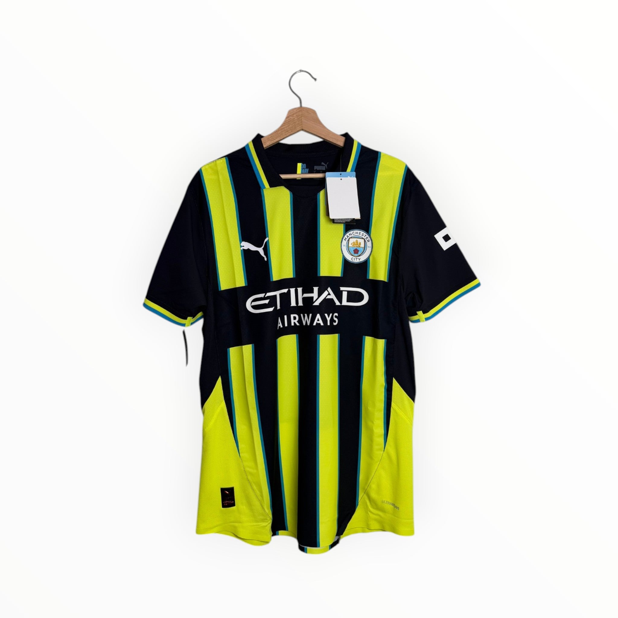 Manchester city puma yellow and black football shirt