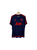 Manchester united navy jersey red logo