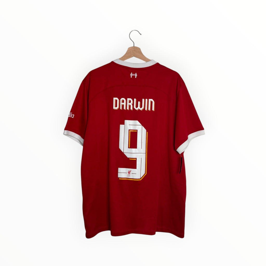 Red and white football shirt Darwin number 9