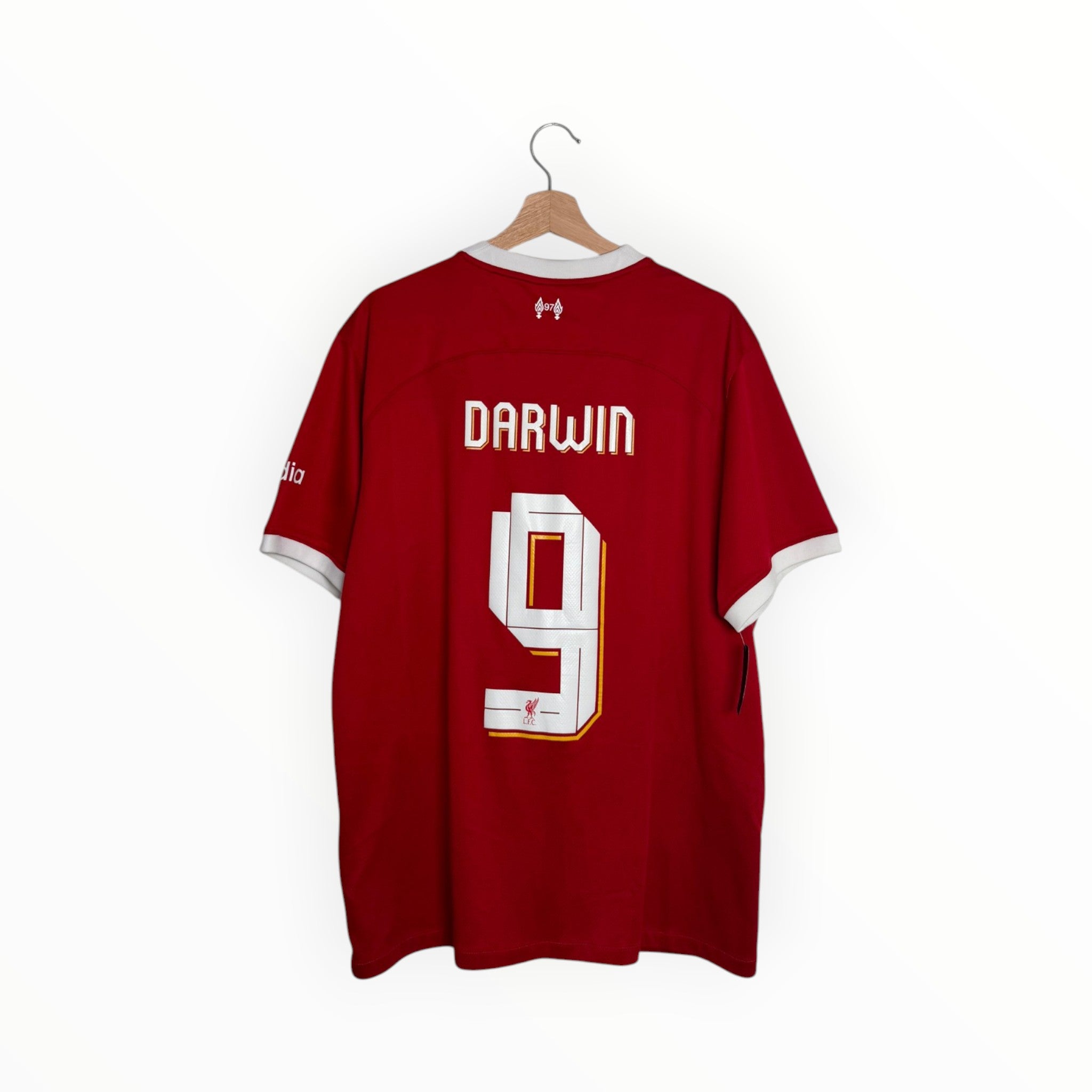 Red and white football shirt Darwin number 9