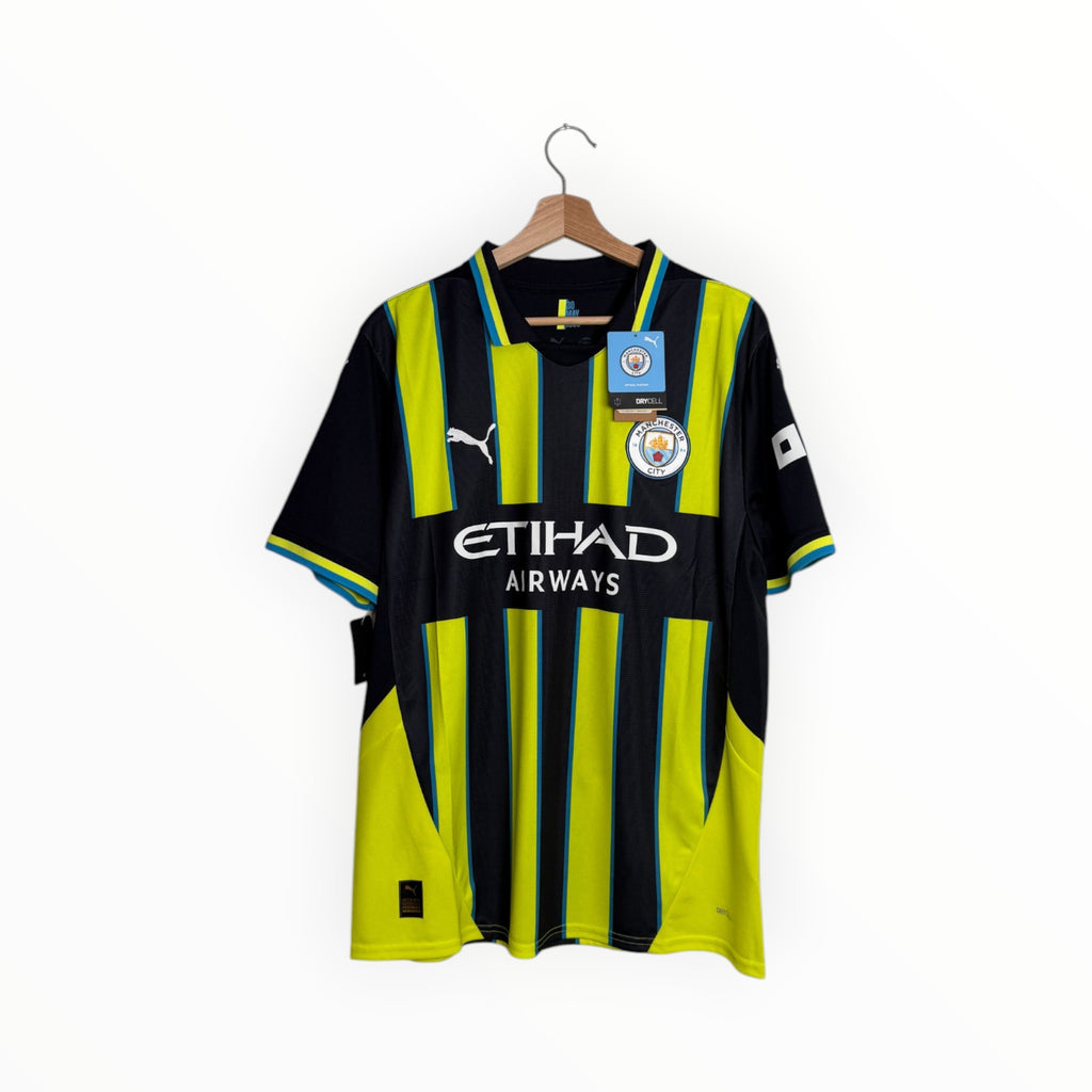 Yellow black blue football shirt puma manchester city