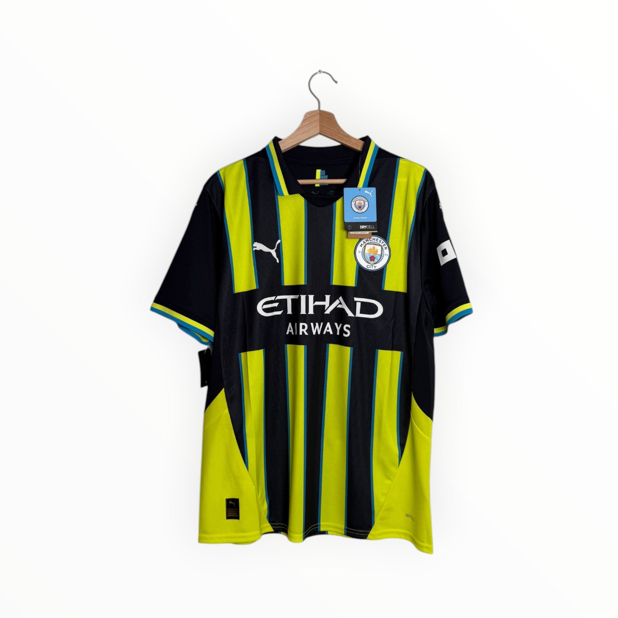 Yellow black blue football shirt puma manchester city