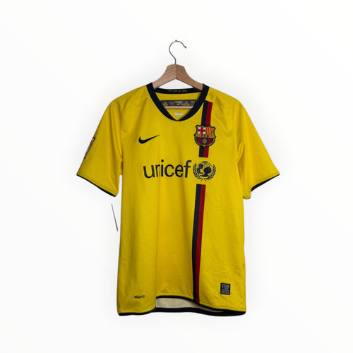 Yellow football shirt with red and blue stripes fc barcelona nike