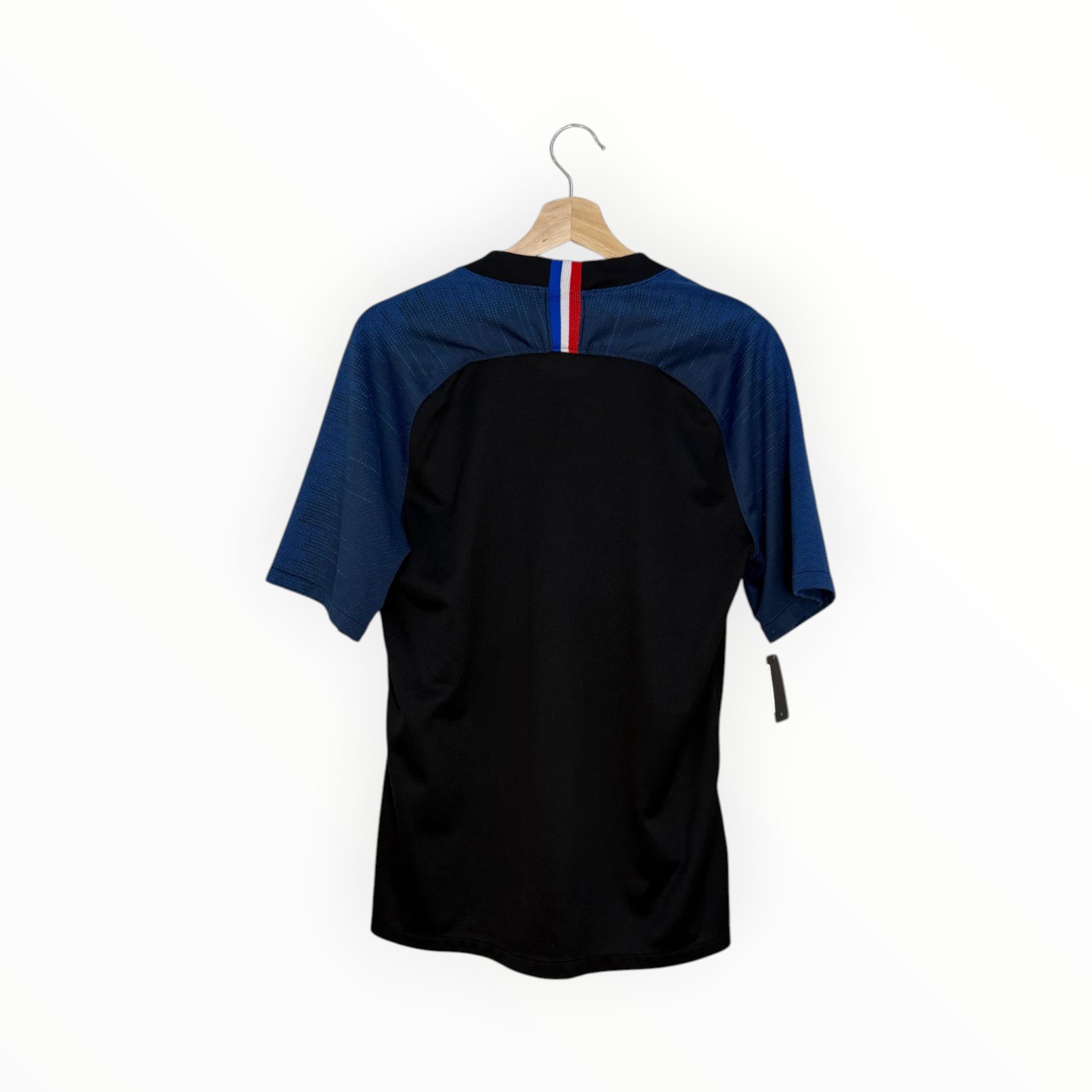 blue and black football shirt psg