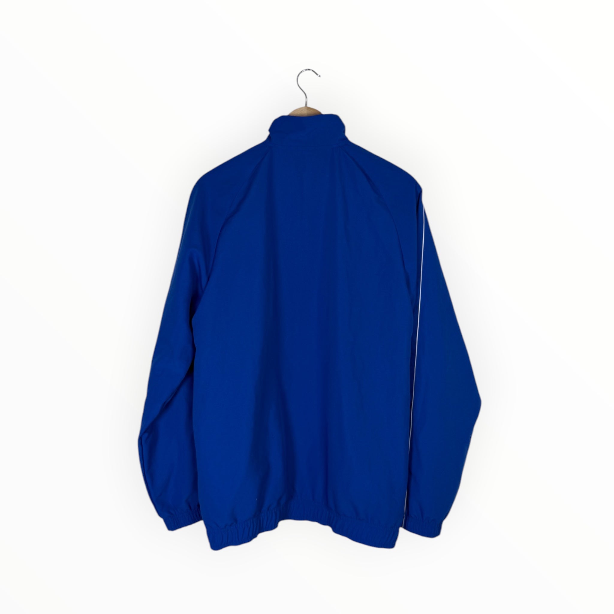 A royal blue lightweight zip-up jacket hanging on a wooden hanger against a plain white background.