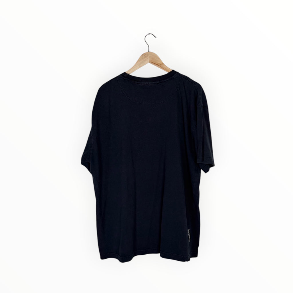 A black short-sleeve t-shirt hanging on a wooden hanger against a plain white background.