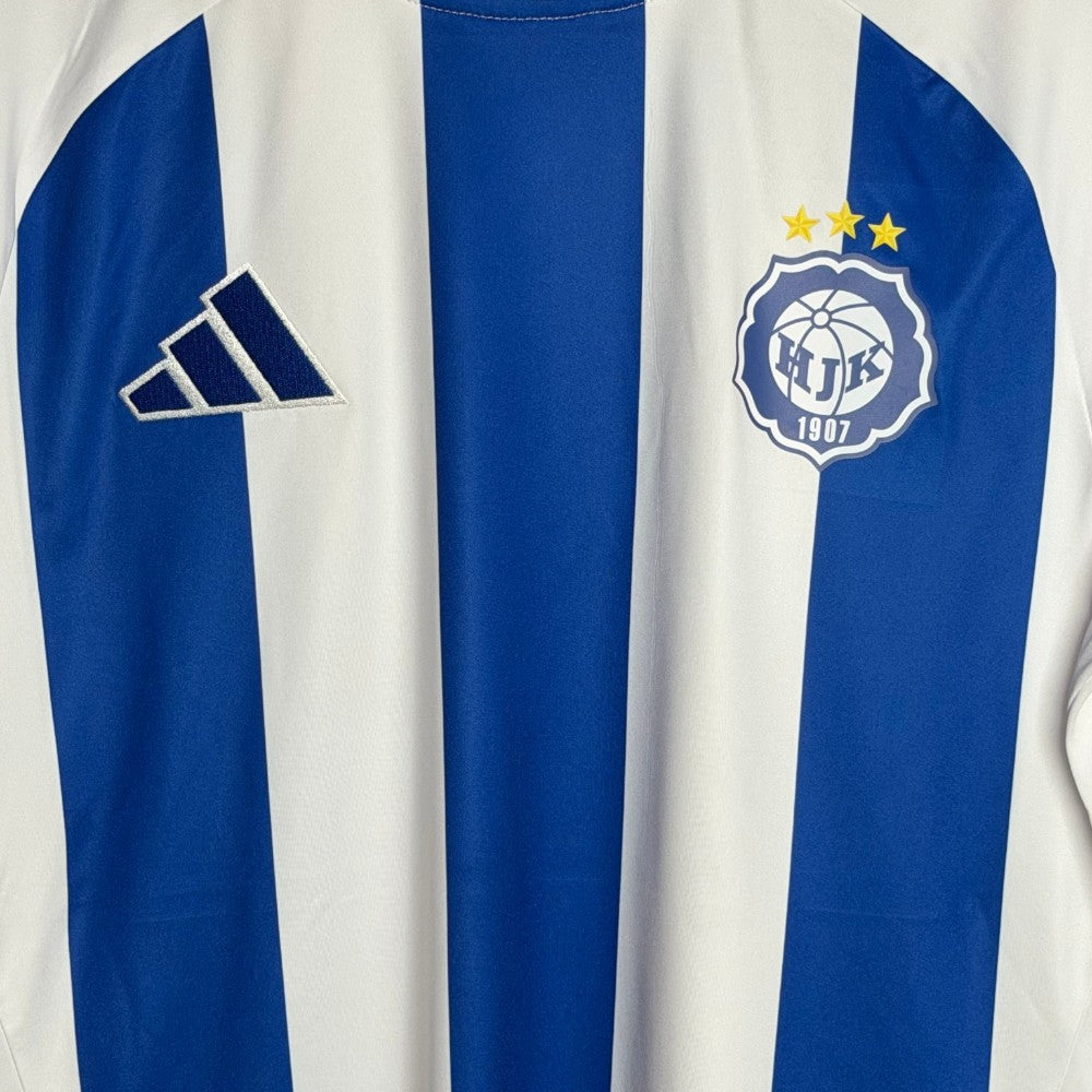 hjk and Adidas blue logo on football shirt