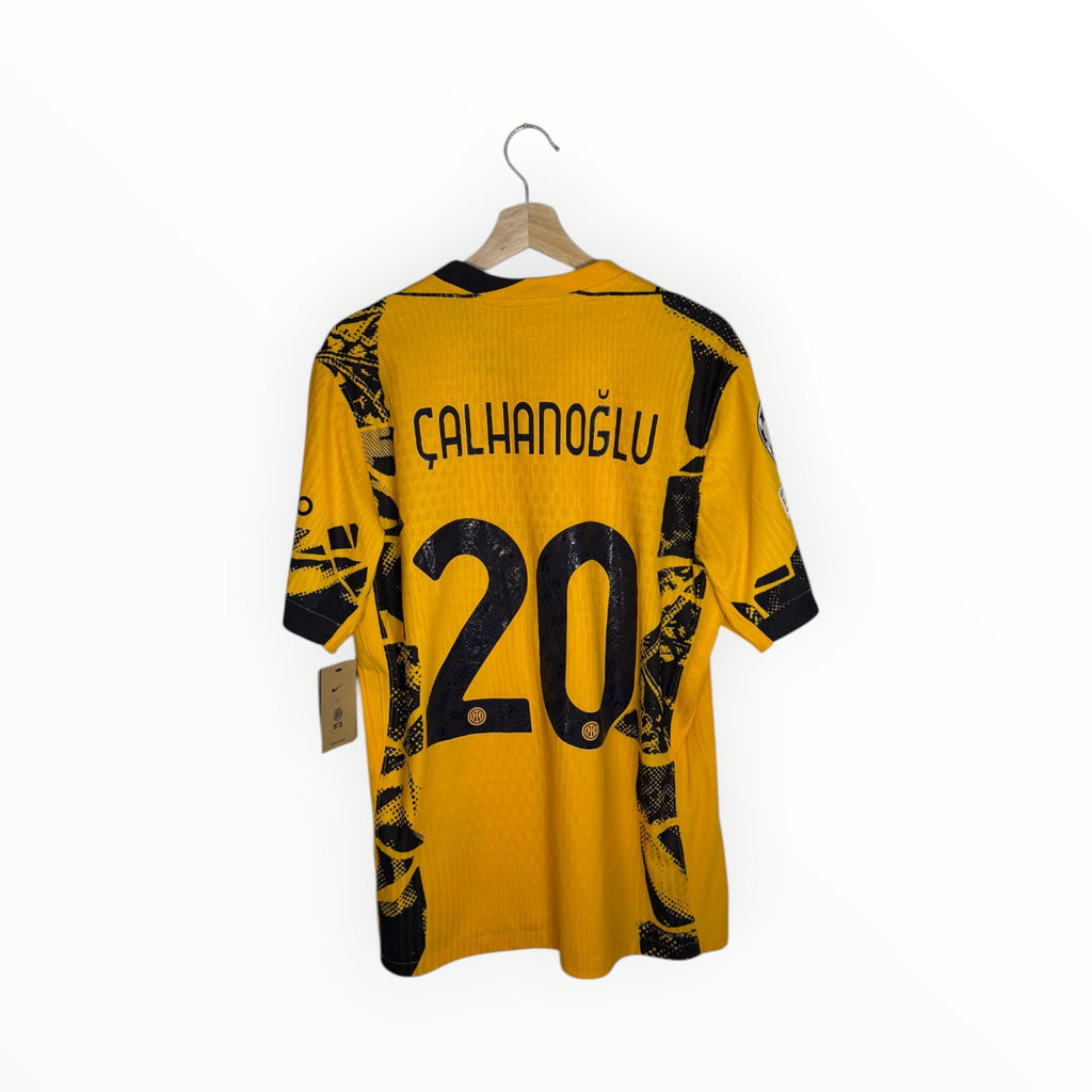 inter milan calhanoglu yellow and black