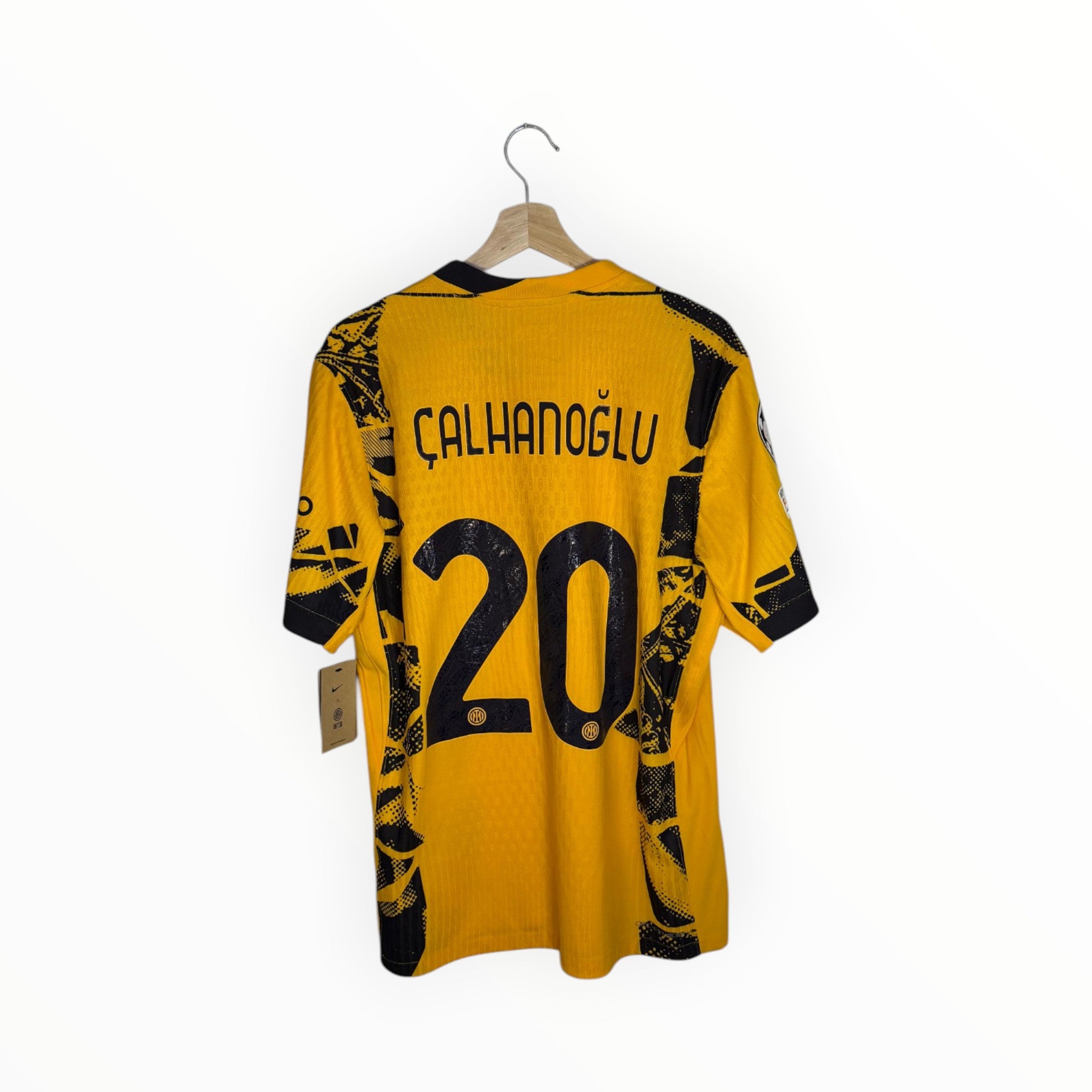 inter milan calhanoglu yellow and black