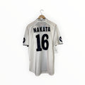 A white short-sleeve sports jersey hanging on a wooden hanger against a plain white background. The back of the jersey features the name 'NAKATA' and the number '16' in black.