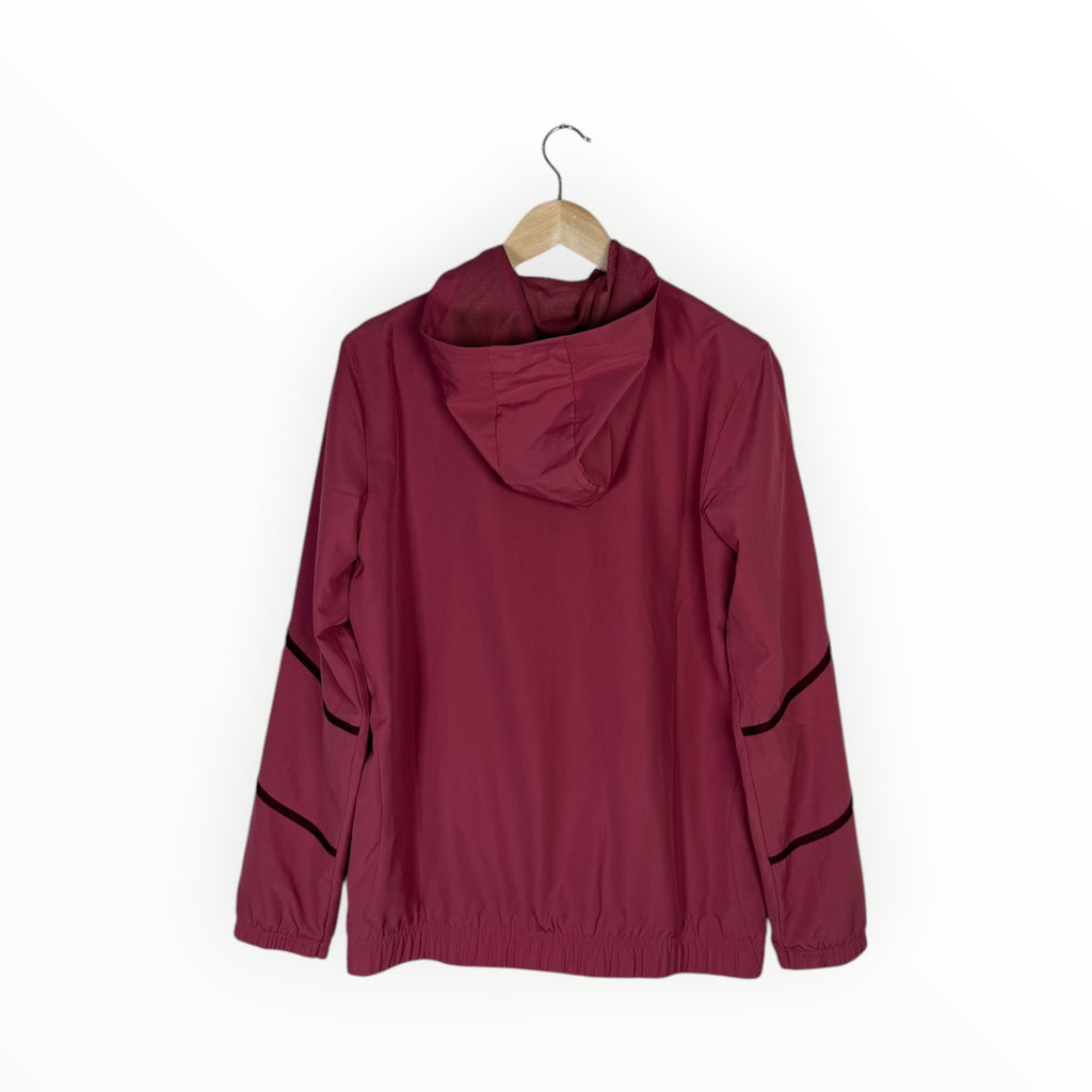 A maroon hooded windbreaker jacket hanging on a wooden hanger against a plain white background.