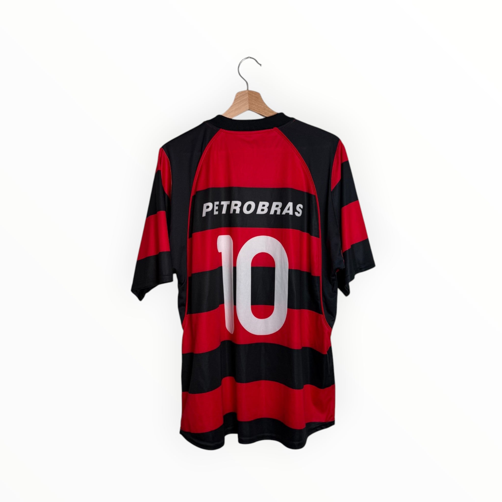 red and black football shirt jersey number 10
