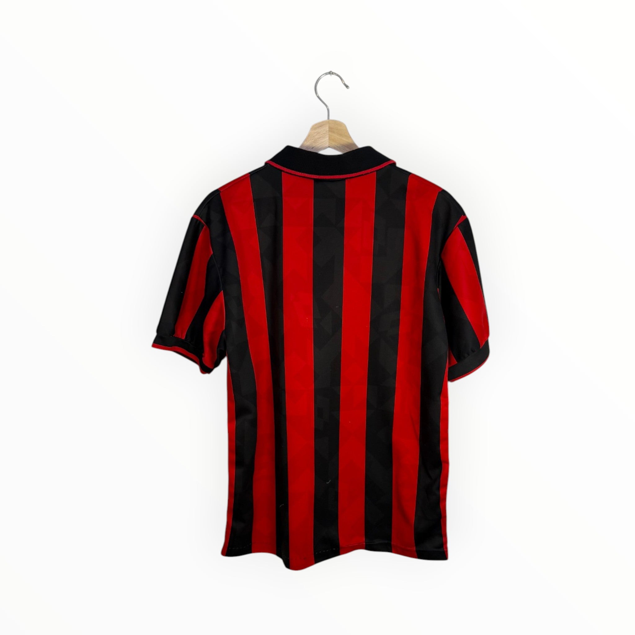 red and black stripes of ac milan kit