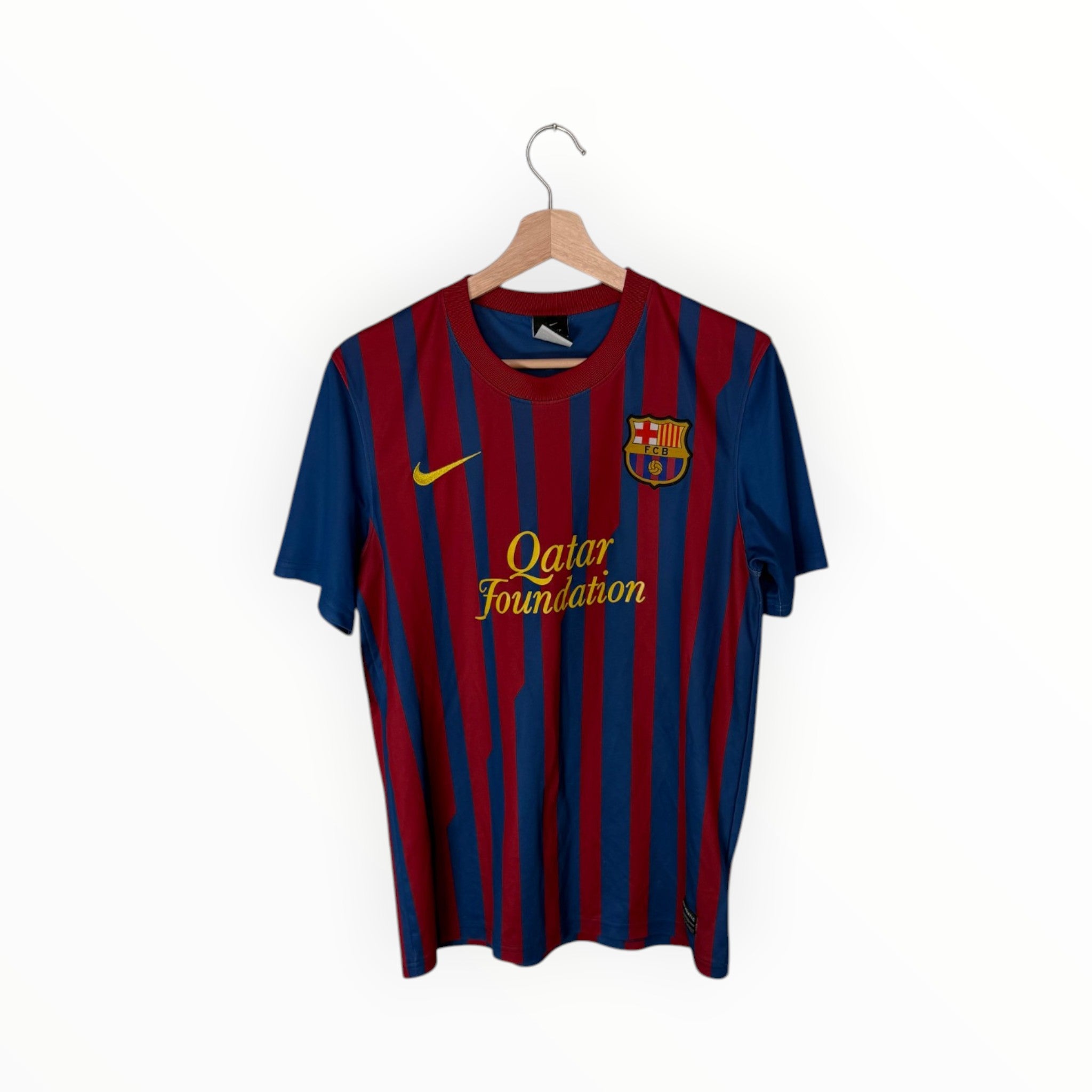 red and blue football shirt qatar foundation nike