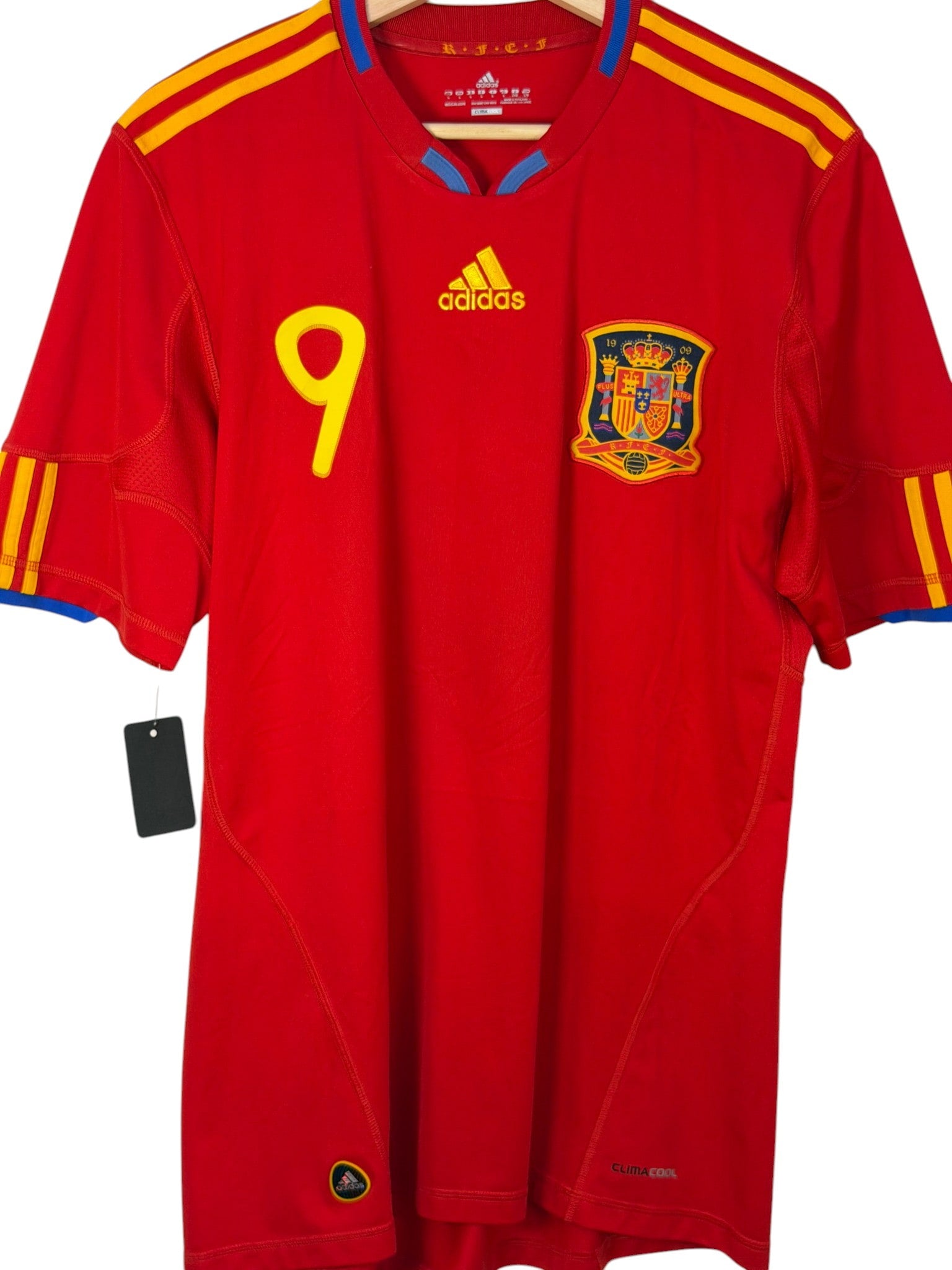 red football shirt spain orange stripes