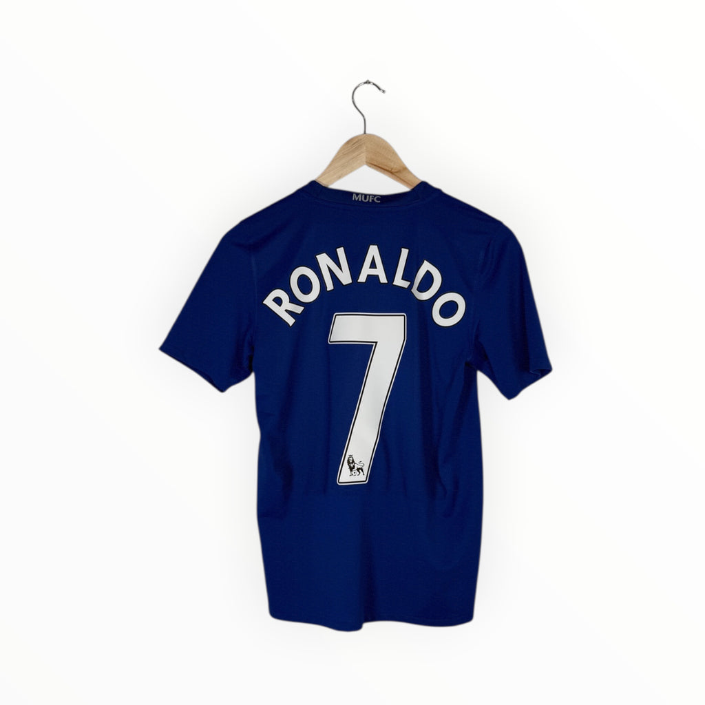 A navy blue short-sleeve soccer jersey with 'RONALDO' and the number '7' printed in white on the back, hanging on a wooden hanger against a plain white background.