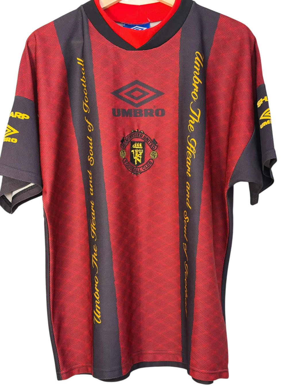 umbro man united red black yellow