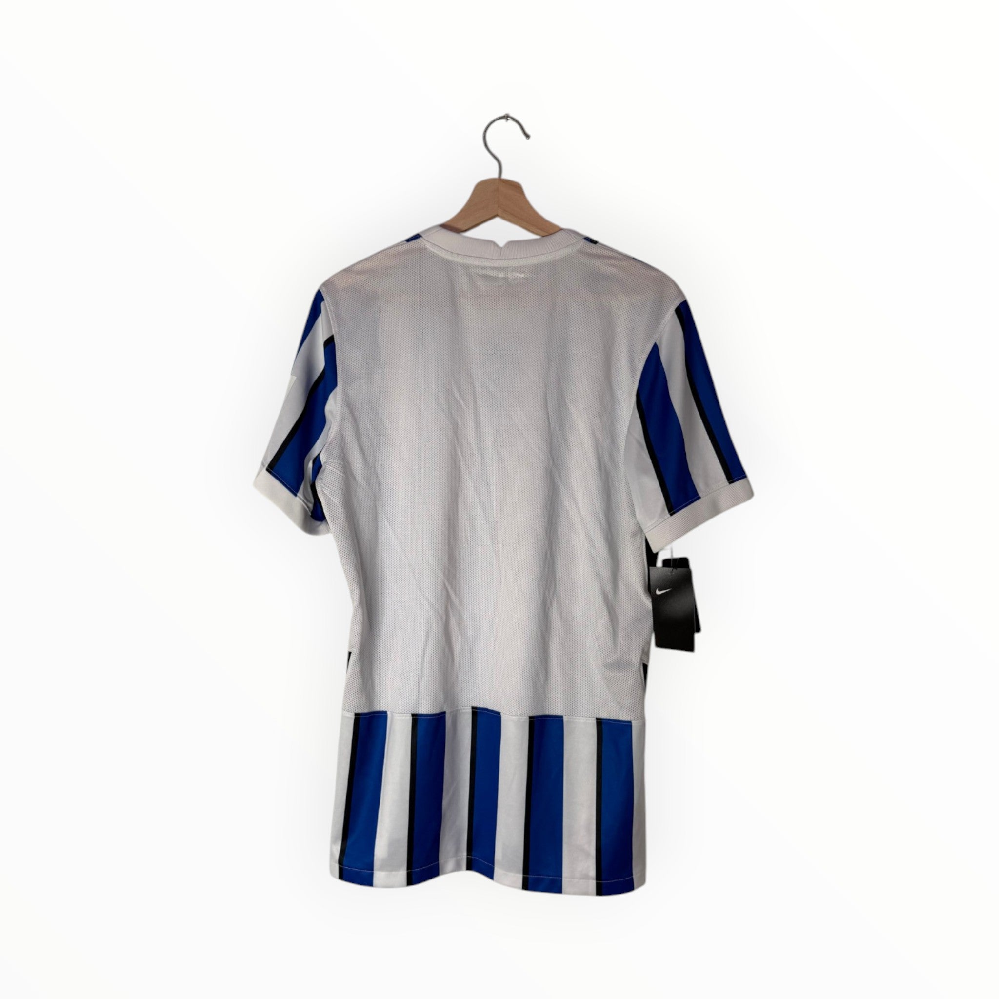 white and blue football shirt new