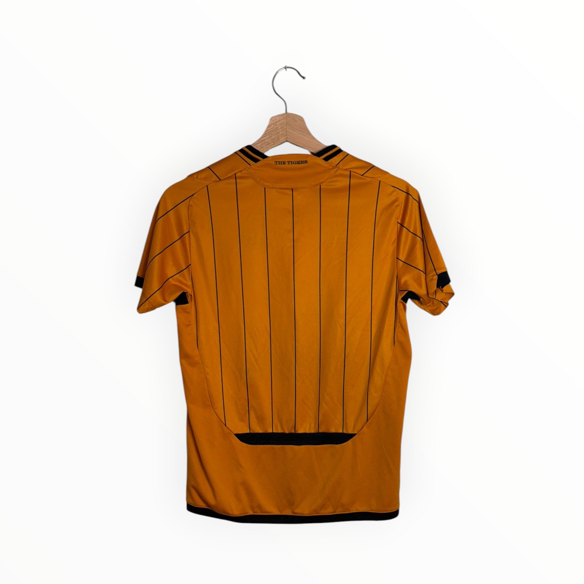 yellow and black football shirt hull